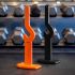 The Barbell Jack is verkrijgbaar in de kleuren oranje en zwart