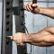 De ATX Cable Belt Squat Machine heeft een instelbare start- en stophoogte voor verschillende lichaamslengtes